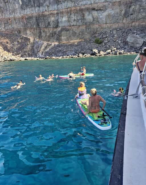 Puerto Rico, Gran Canaria: boat trip, drinks, food, paddle surfing, snorkeling. - Return Journey with Coastal Views