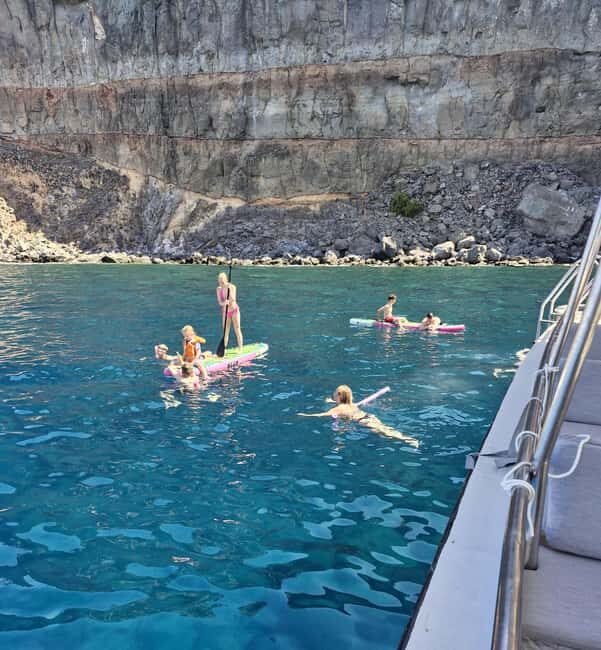 Puerto Rico, Gran Canaria: boat trip, drinks, food, paddle surfing, snorkeling. - The Real Deal: What Makes This Tour Stand Out