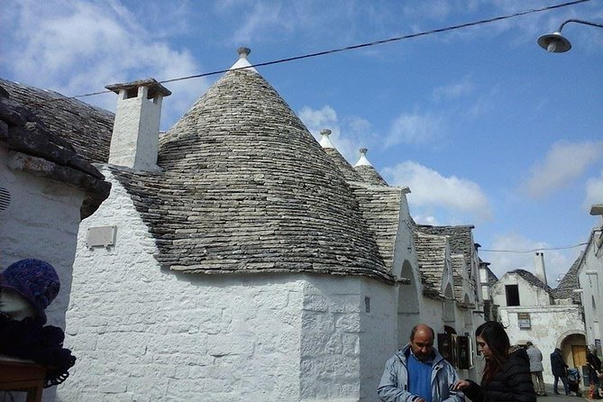 Puglia Full-Day Tour: Bari, Trulli of Alberobello, Castel Del Monte and Sassi of Matera - Exploring the Sassi of Matera