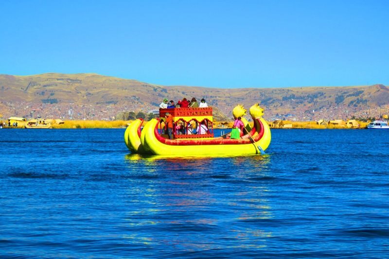 Puno Uros Floating Islands Half-Day Small Group Discovery - The reed boat and the main island market