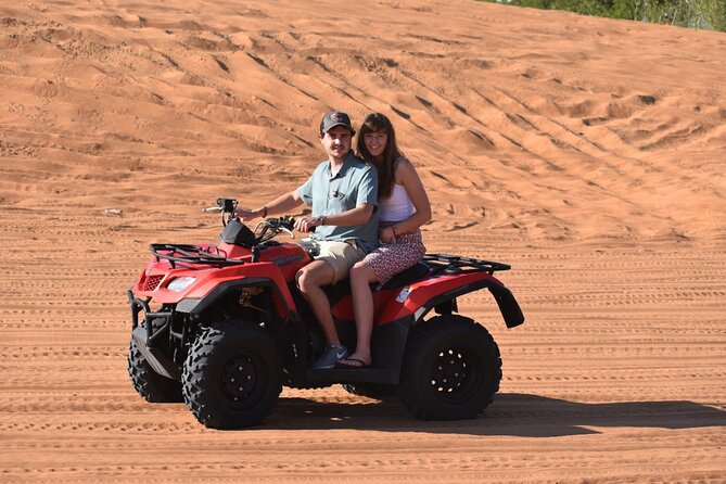 Quad Bike Tour ,BBQ Dinner, Camel Ride, Sand Surf, Belly Dance and Much More - Evening Desert Safari Adventure