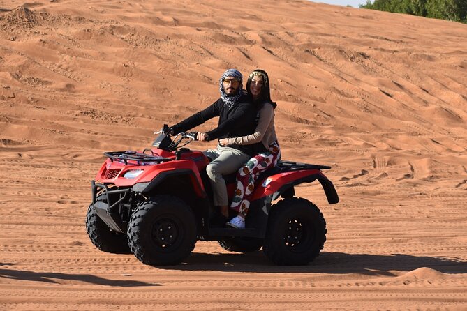 Quad Bike Tour ,BBQ Dinner, Camel Ride, Sand Surf, Belly Dance and Much More - The Sum Up