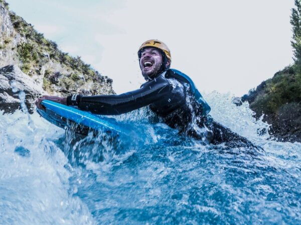 Queenstown: White Water Surfing Along the Kawarau River - Live Tour Guide and Pickup Service