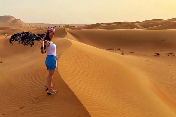 Red Dune 4x4 Desert Safari With Camel Ride & BBQ Dinner - Capture Stunning Sunset Views in the Desert