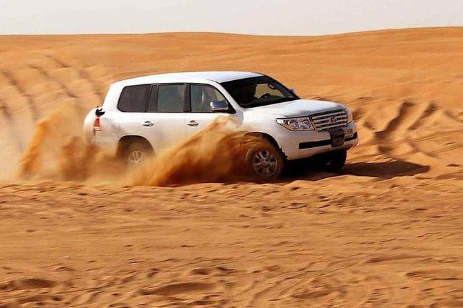 Red Dune Desert Safari With Quad Bike, Camel Ride And BBQ Dinner - Activities Included