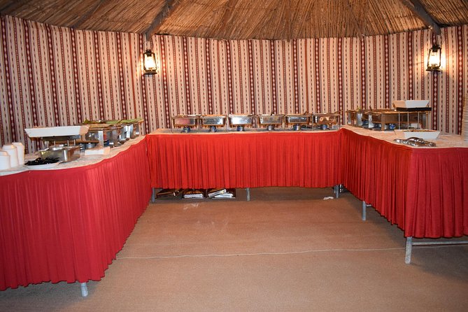 Red Dune Desert Safari,Camp Activities, BBQ Dinner, Live Show & Quad Bike Drive - Dune Bashing and Sandboarding