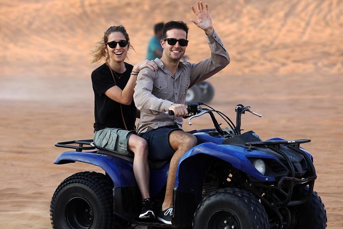 Red Dunes by Quad Bike With VIP Camp, Camels, Sandboarding & Falcon - Pricing and Booking Details