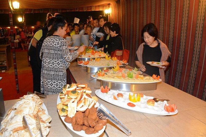 Red Dunes Quad Bike Safari, Sand Surf, Camels and BBQ - Red Dunes Quad Bike Safari