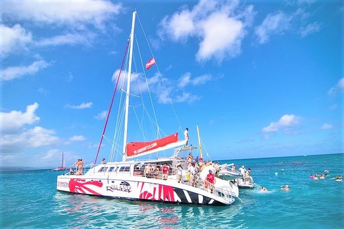 Reggae Catamaran Cruise With Snorkeling & Hotel Pick-Up From Montego Bay - The Sum Up