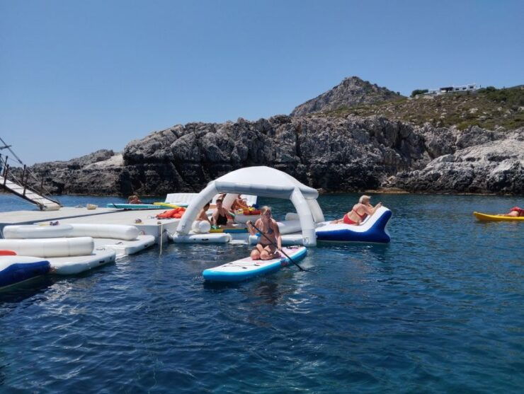 Rhodes: Boat Cruise With Food, Drinks, SUP, Kayak & Swimming - Experience Highlights