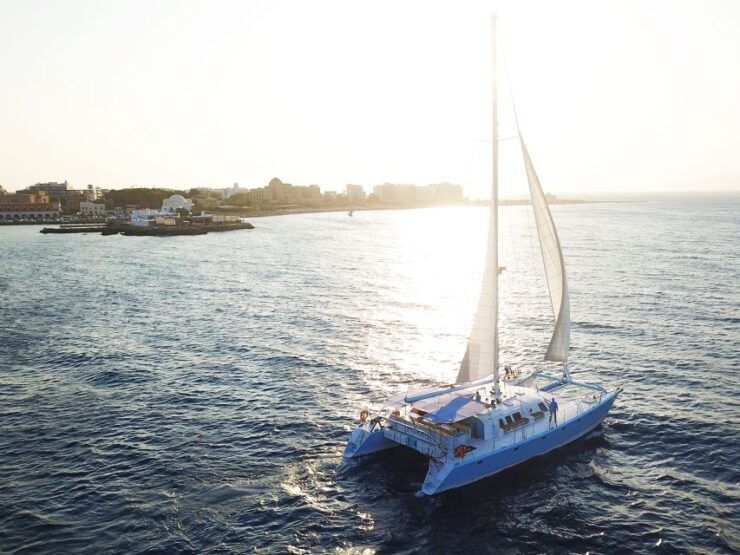Rhodes: Catamaran Cruise With Snacks, Wine & Sunset Viewing - Language Options