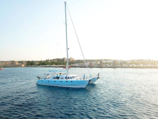 Rhodes: Catamaran Cruise With Snacks, Wine & Sunset Viewing - Catamaran Highlights