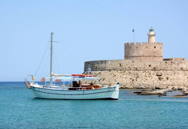 Rhodes: Day Cruise to Beaches and Caves With Snacks & Drinks - The Sum Up