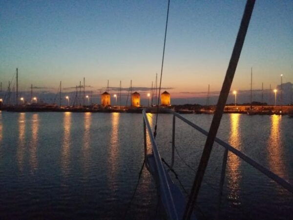 Rhodes: Sunset Cruise With Live Music, Wine & Greek Buffet - Booking Tips