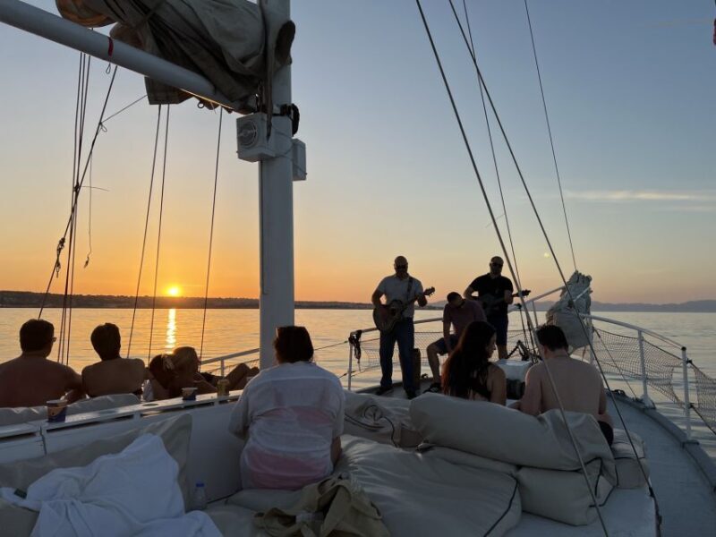Rhodes: Sunset Cruise with Open Bar, Dinner, & Live Music - Gourmet Greek Dinner & Open Bar