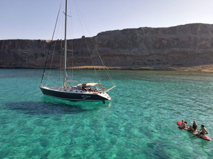 Rhodes Town: Private Sailing Cruise With Swim Stops & Meal - Overview of the Private Sailing Cruise