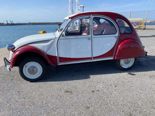 Ride With a Citroen 2CV Dolly 1989 Red-White for 12 Hours - Group Pricing