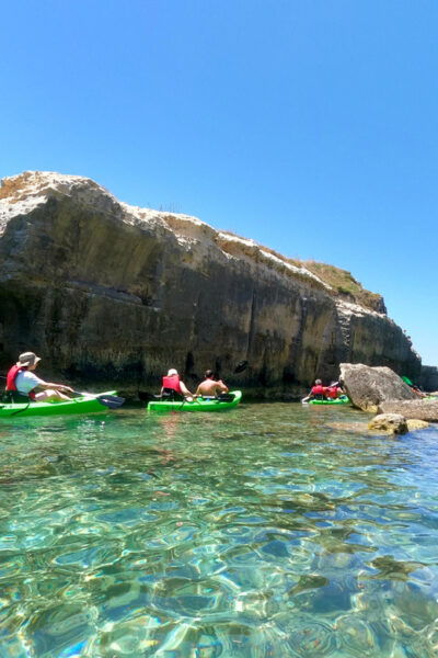 Roca Vecchia: Kayak and Canoe Tour to La Grotta Della Poesia - Explore Caves Frequented by Pirates