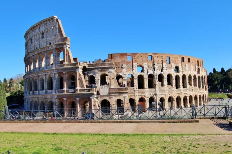Rome: Colosseum Tour with Arena Floor & Roman Forum - Walking through the Colosseum