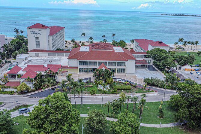 Round Trip Transportation to Cable Beach/Bahamar Resort/Breezes - The Sum Up