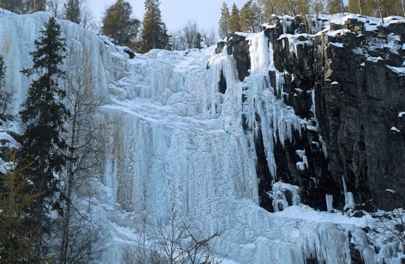 Rovaniemi: Korouoma Canyon Frozen Waterfalls Day Trip - Warming Up Around the Campfire