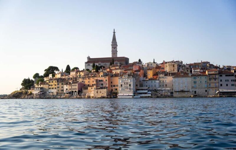 Rovinj: Dolphins at Sunset & Island Swimming Speedboat Tour - The Sunset and Rovinj from the Sea: A Picture-Perfect End