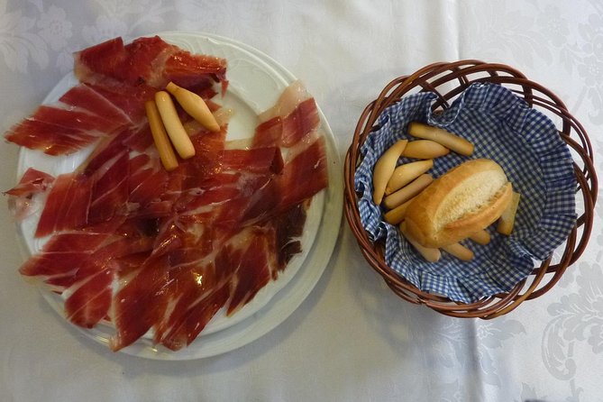 Royal Palace of Madrid With Wine and Spanish Ham Tasting - What To Expect
