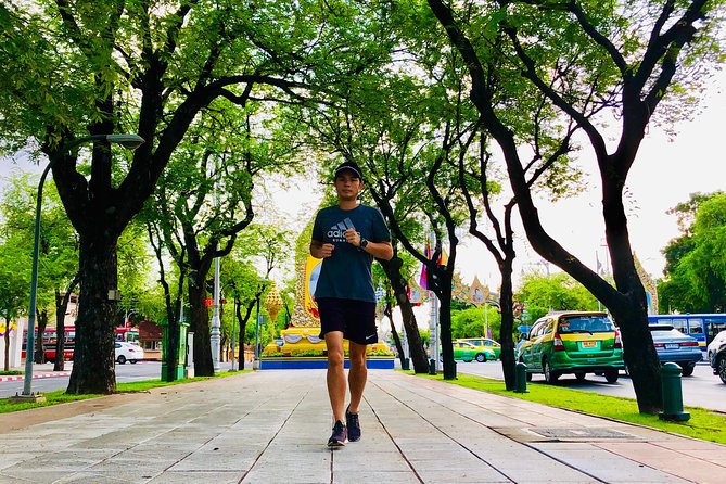 Running Tour Through Historic Center, Grand Palace, Wat Pho and More. - Serene Wat Pho Temple Tour