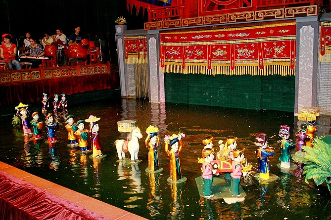 Saigon Evening Tour With Water Puppet Show And Dinner Cruise - Presenting Voucher Before Starting