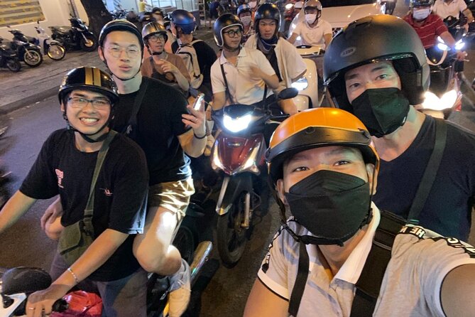 Saigon Foodie and Sightseeing Scooter Tour - Ho Chi Minh City - Explore Ho Chi Minh Citys Landmarks and Markets