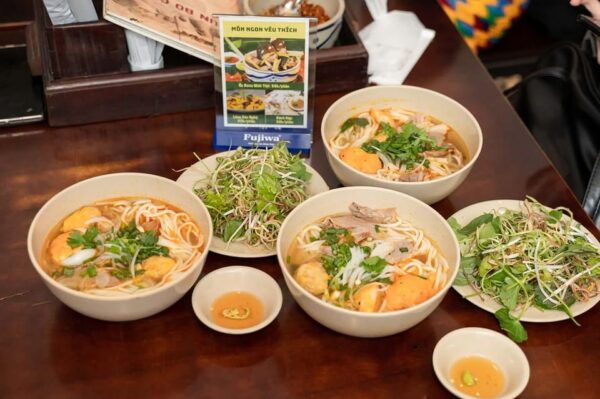 Saigon: Street Food Tasting & Sightseeing Tour by Motorbike - Local Culture and Cuisine