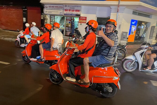 Saigon Vespa By Night Street Food With Female Riders Ao Dai - Discovering Saigons Hidden Culinary Gems