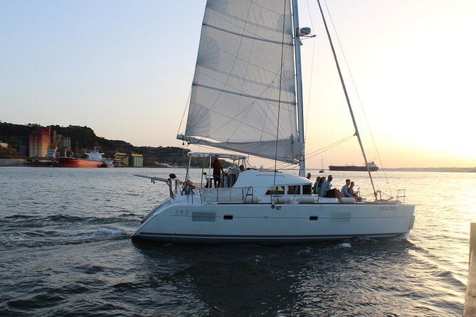 Sailing Catamaran Group Cruise at Sunset Time With Welcome Drink - What To Expect