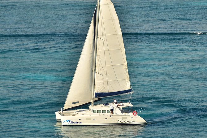 Sailing Catamaran PLATINO With Open Bar to Isla Mujeres - Selecting Date and Travelers