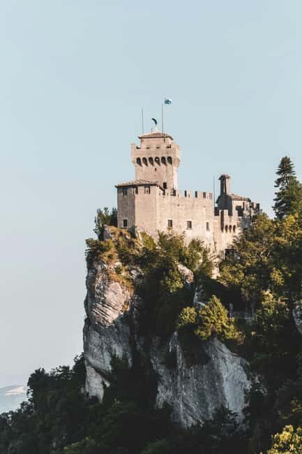 San Marino in Small Groups: Guided Tour with 7 Museums and Towers Pass - Discovering San Marino’s Rich Landmarks