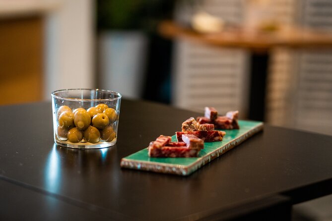 Sangria and Tapas Tasting With Stunning Rooftop Views of Sevilla - Unveiling the Secrets of Traditional Spanish Tapas