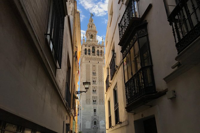 Santa Cruz Neighbourhood Guided Walking Tour in Seville - Pricing and Booking
