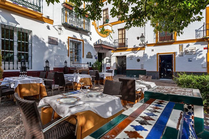 Santa Cruz Neighbourhood Guided Walking Tour in Seville - Tour Highlights and Cultural Insights