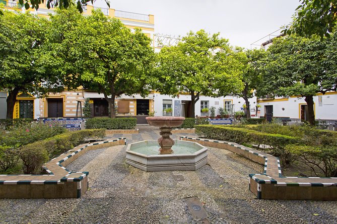 Santa Cruz Neighbourhood Guided Walking Tour in Seville - Immersion in Local Culture and Traditions