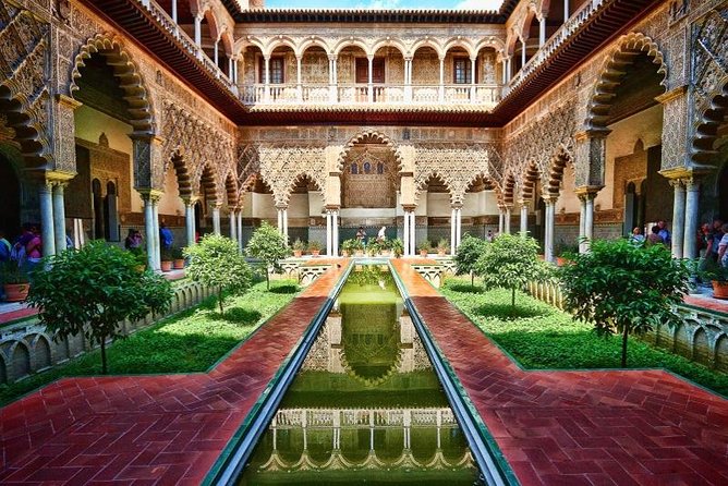 Santa Cruz Quarter and Alcazar Guided Day Tour in Seville - Tour Overview and Highlights