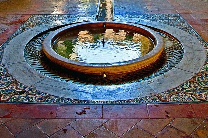 Santa Cruz Quarter and Alcazar Guided Day Tour in Seville - The Sum Up