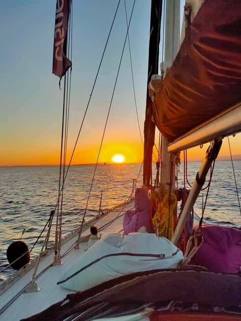 Santa Pola: Sailboat trips to Tabarca, snorkeling, and sunset with tasting - Overview of the Experience