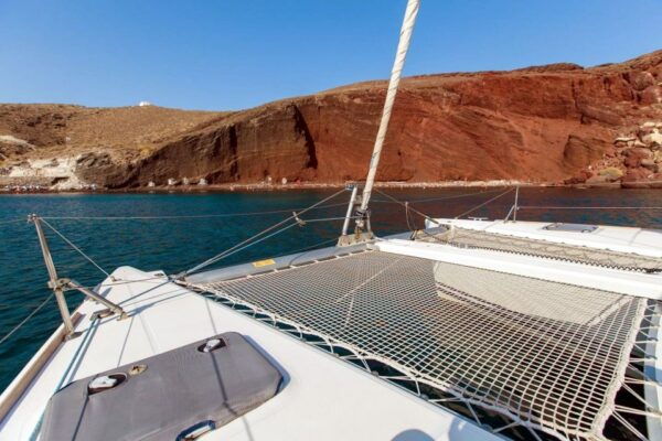 Santorini: 7-Hour Private Catamaran Cruise With Food & Drink - Departure and Itinerary