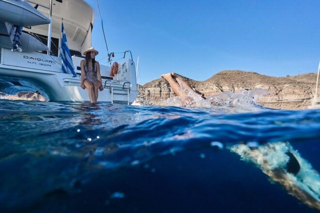 Santorini: Caldera Catamaran Cruise With Meal and Drinks - Snorkeling in Crystal-Clear Waters