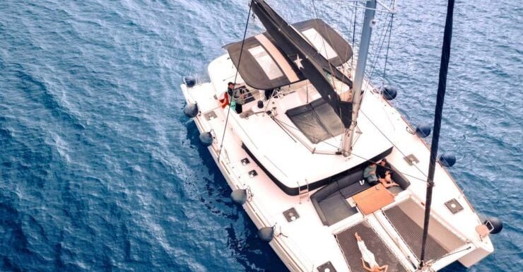 Santorini: Catamaran Cruise With Lunch, Drinks, & Oia Visit - Host and Pickup Information