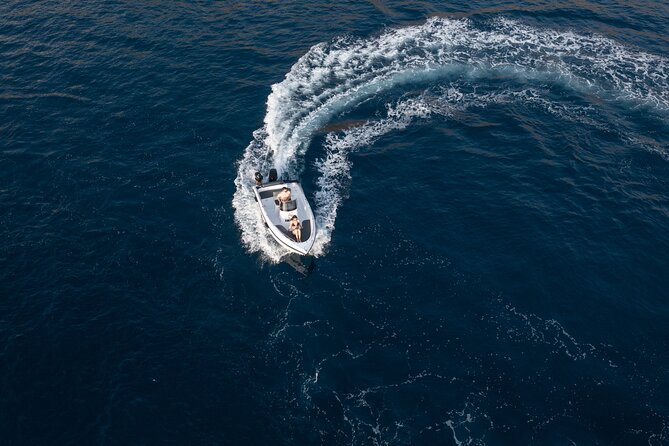 Santorini License-Free Boat Rental: Be a Captain for a Day - Pricing and Guarantee