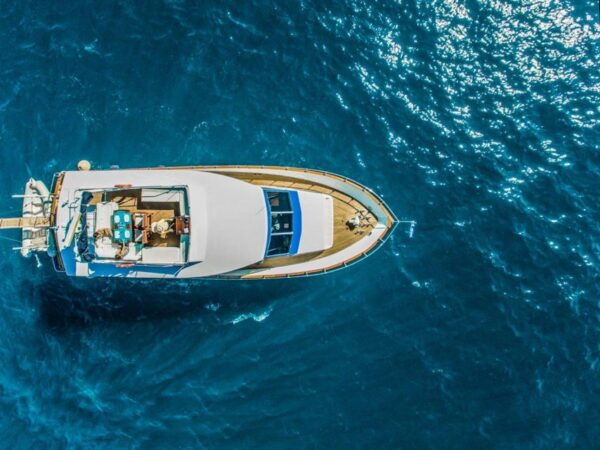 Santorini: Motor Yacht Day Cruise With 5-Course Lunch - The Sum Up