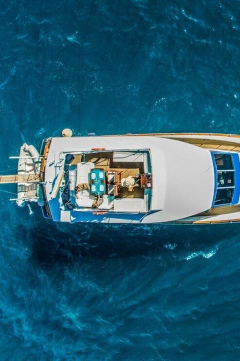 Santorini: Motor Yacht Private Cruise With 5-Course Meal - Pricing and Booking Details