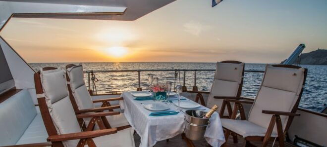 Santorini: Motor Yacht Sunset Cruise With 5-Course Dinner - Frequently Asked Questions