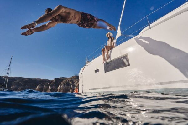 Santorini Oia: Caldera Catamaran Cruise With Meal & Drinks - Full Description of the Cruise